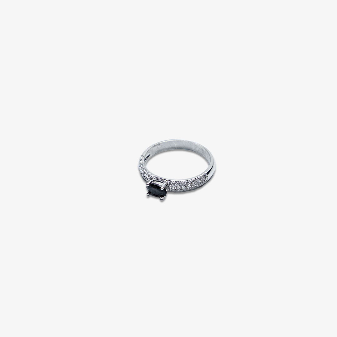black-solitaire-ring-with-pave-band